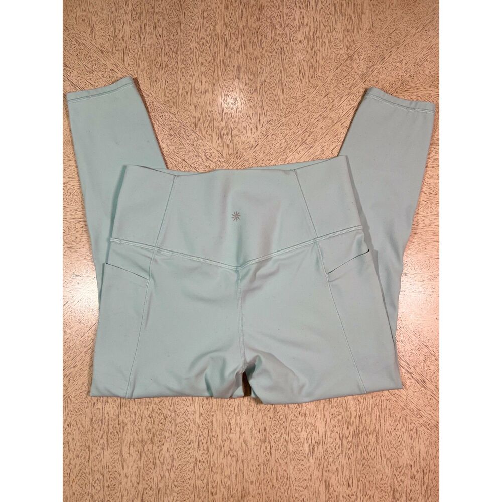 Athleta Salutation Stash Pocket II 7/8 Leggings Medium Blue Green High Rise